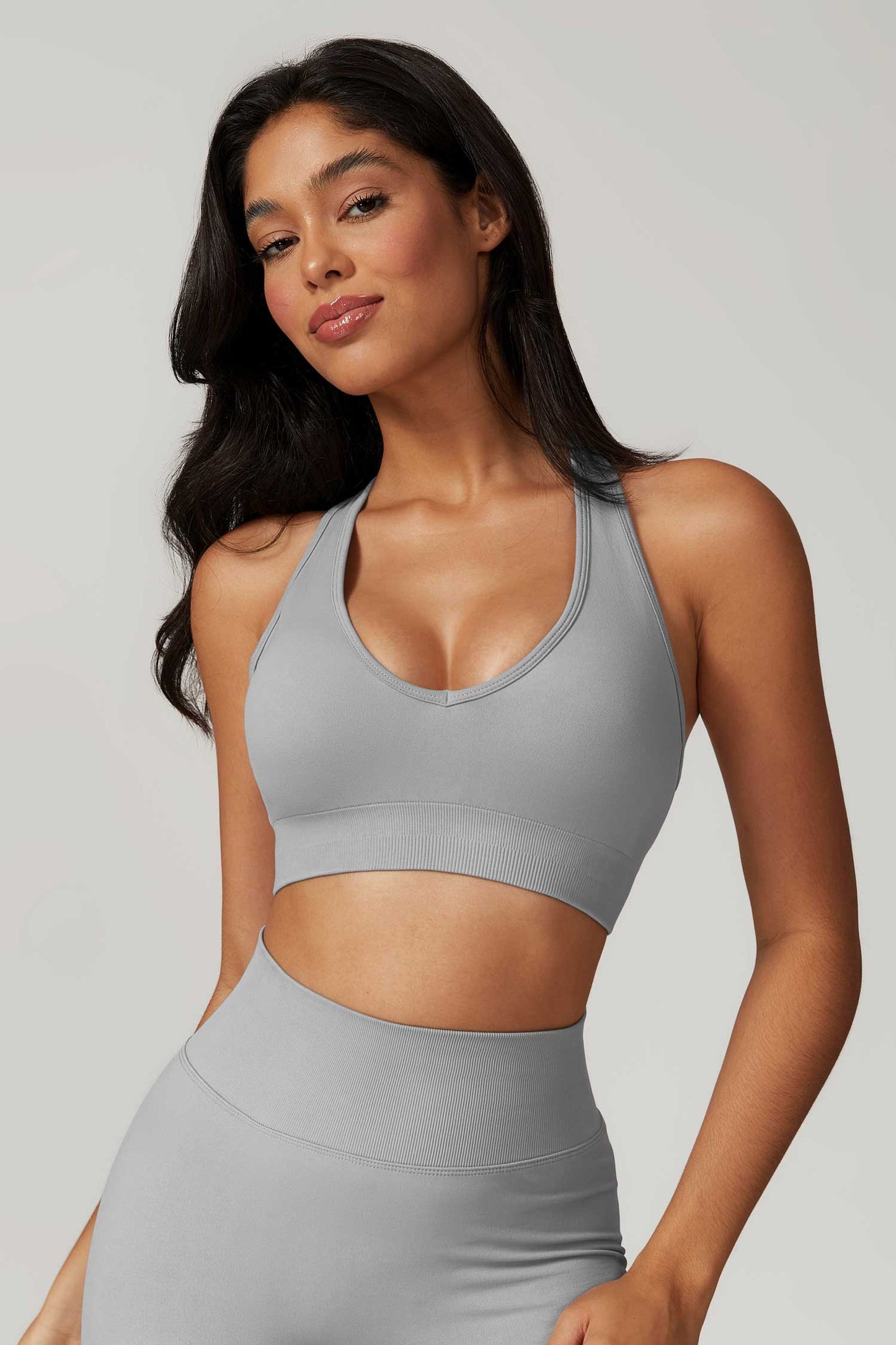 HR7692-1 Quick-drying backless yoga bra with a neck strap, providing a bare sensation for outdoor fitness. This tight-fitting sports underwear is designed for women who enjoy running